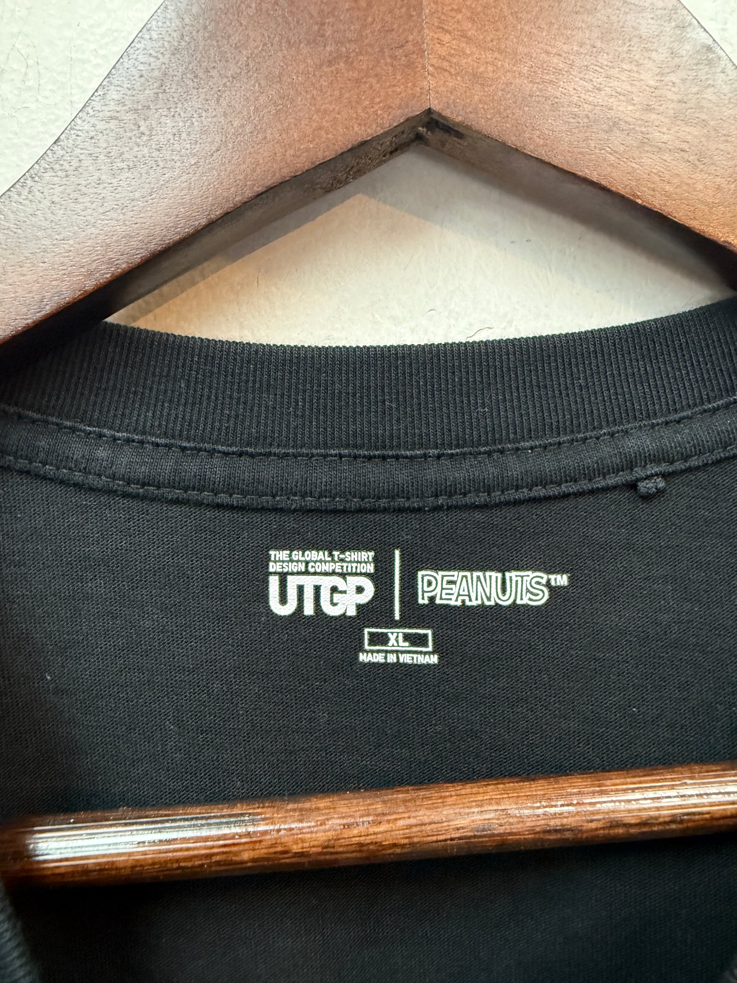 Kaws x Peanuts Uniqlo Snoopy Tee