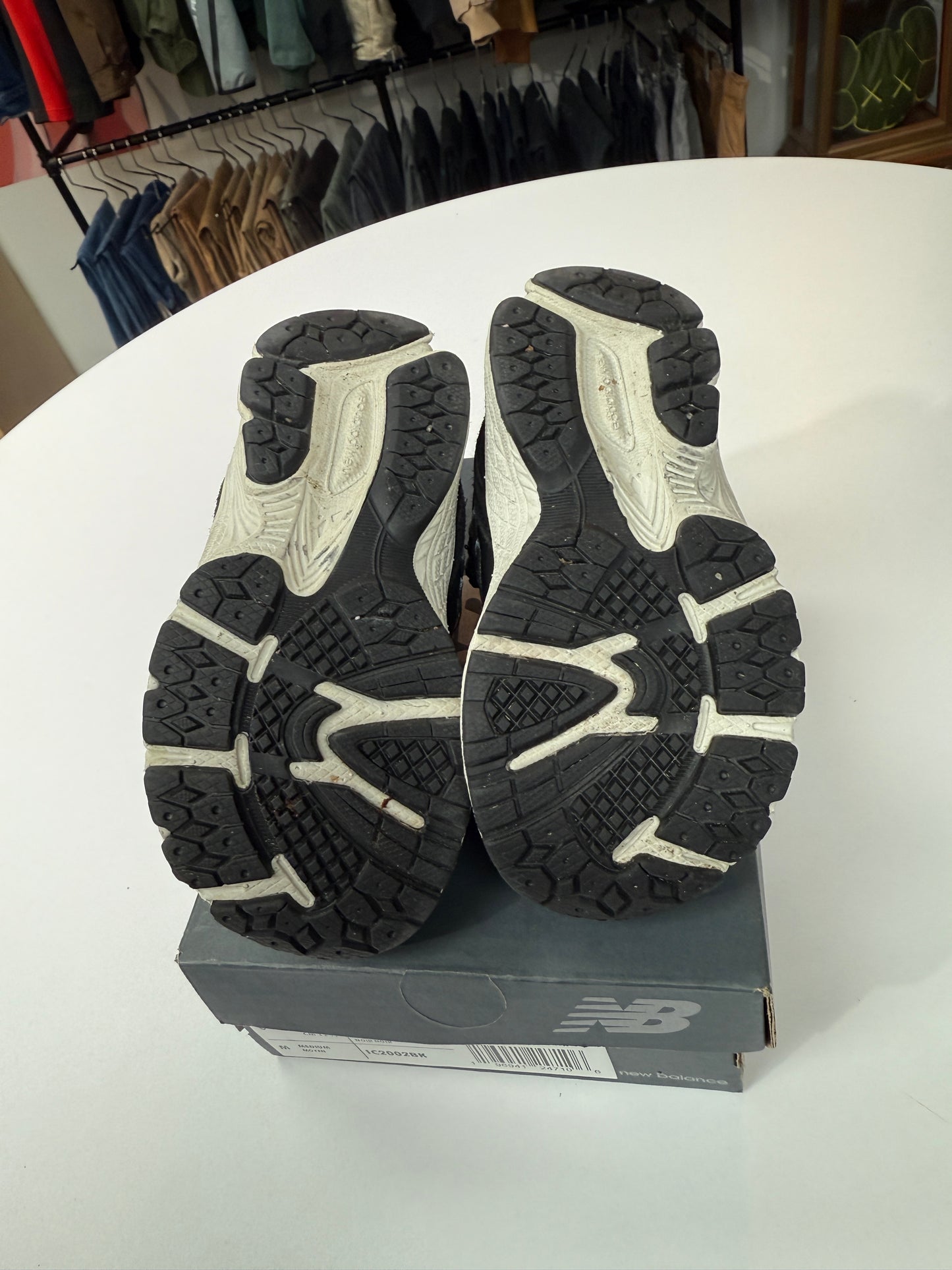 Preowned Black New Balance 2002R