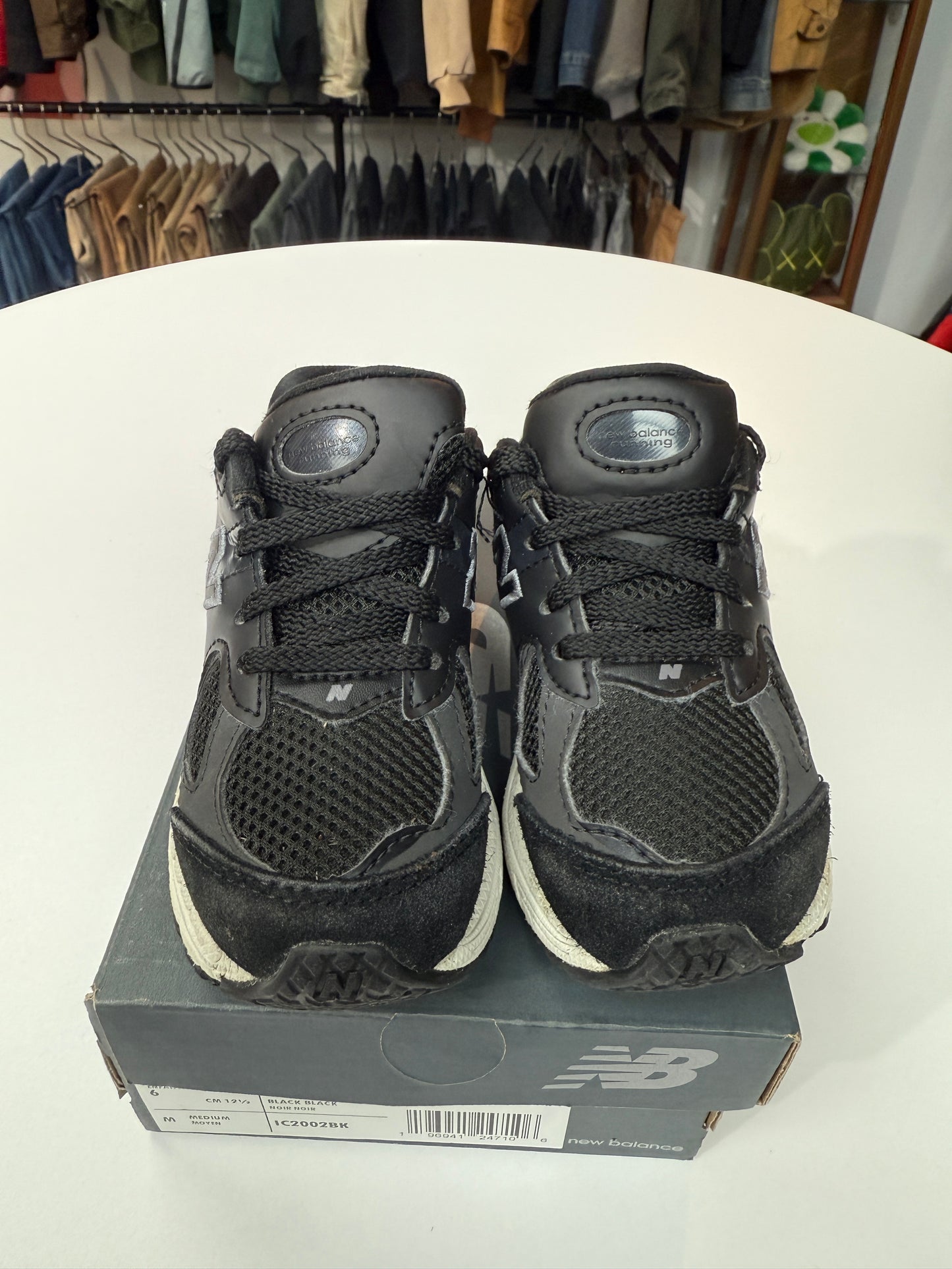 Preowned Black New Balance 2002R