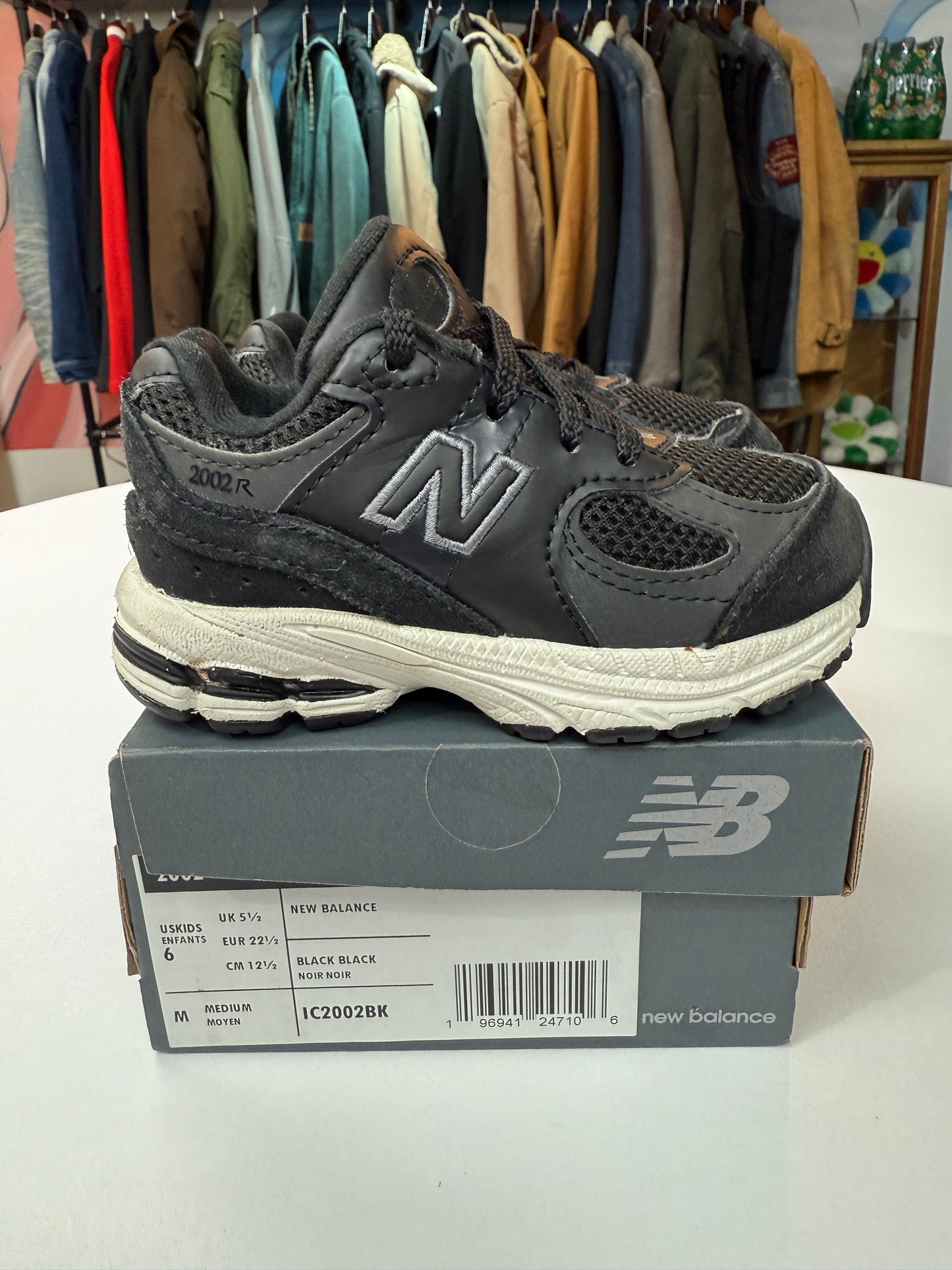 Preowned Black New Balance 2002R