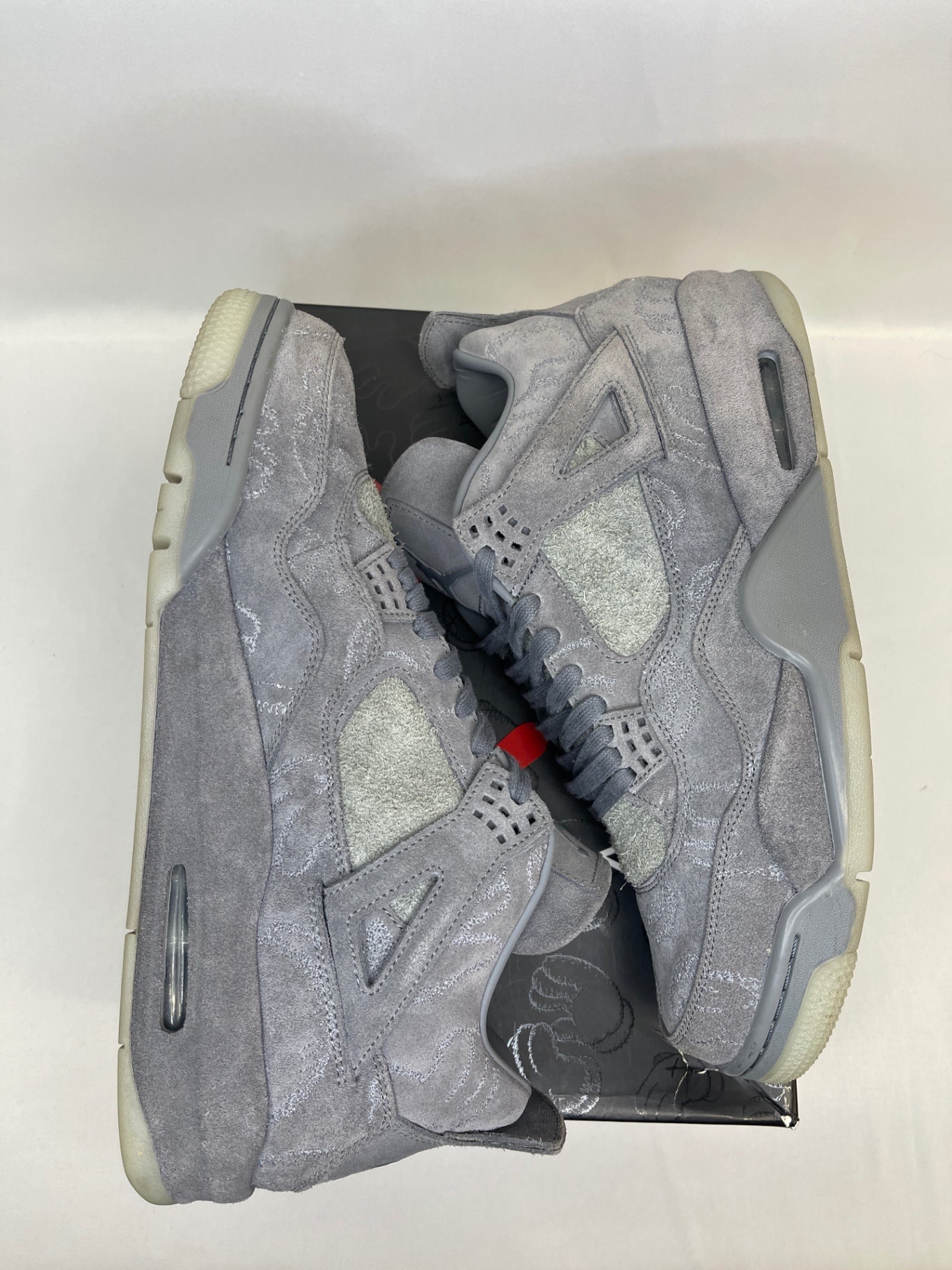 Kaws x Jordan 4 Preowned