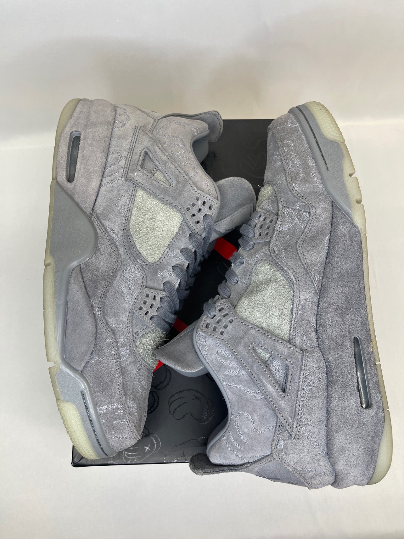 Kaws x Jordan 4 Preowned