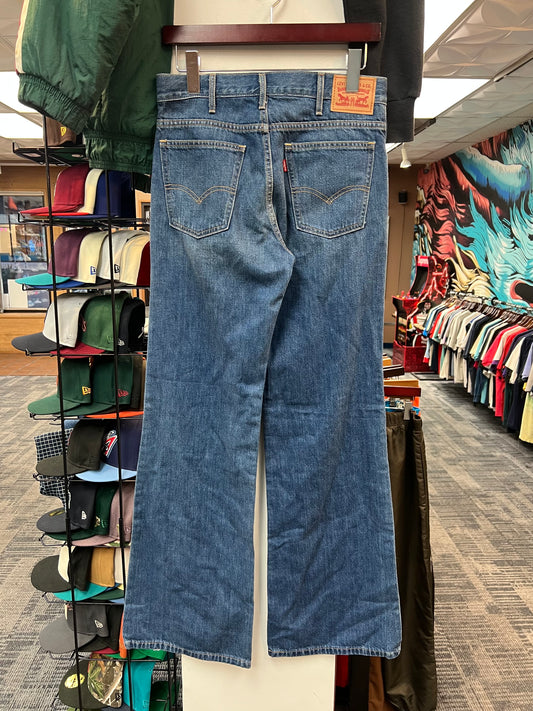 Levi’s Distressed Flared Jeans