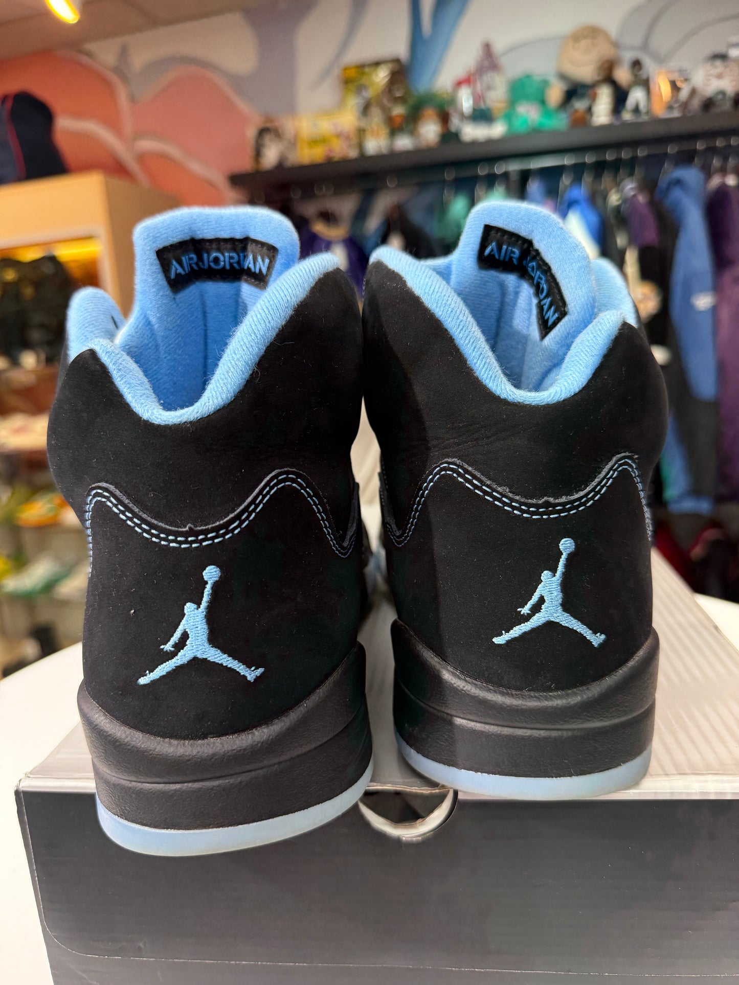 Preowned Black University Blue Jordan 5
