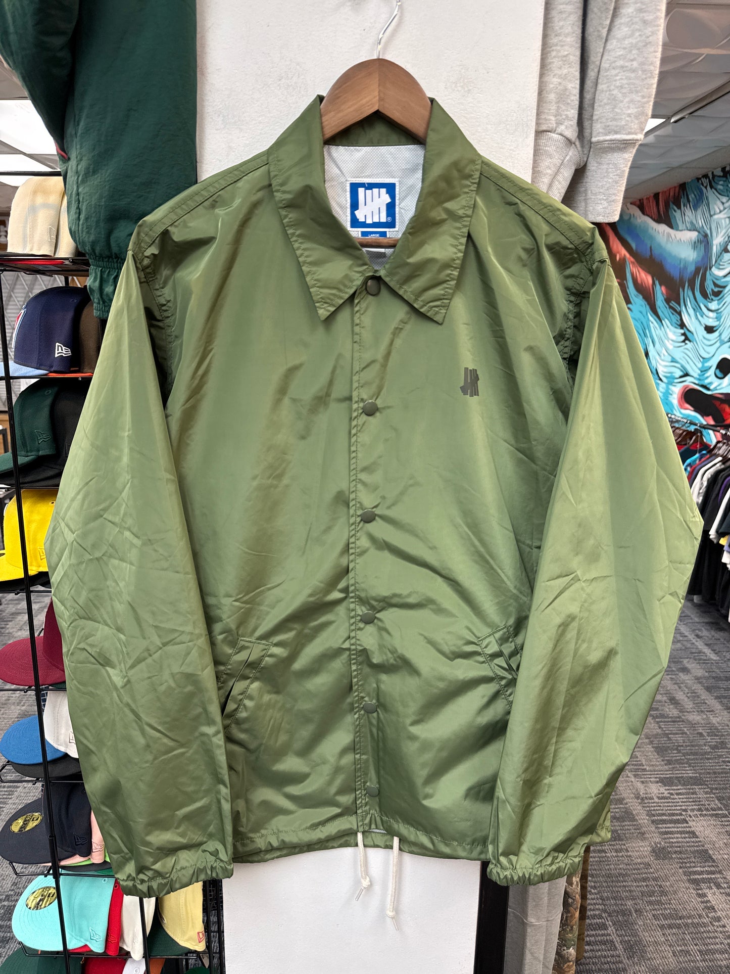Undefeated 5 Strike Coach Jacket Olive
