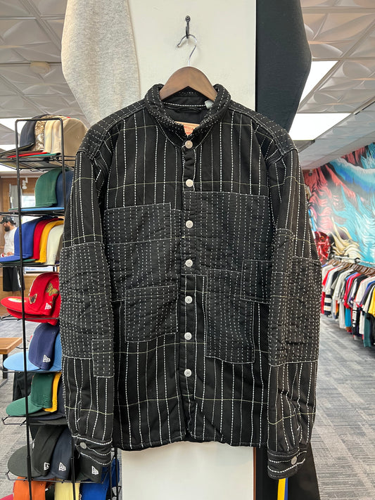 Denim Tears x Levi’s Peace Patchwork Puffer Coat