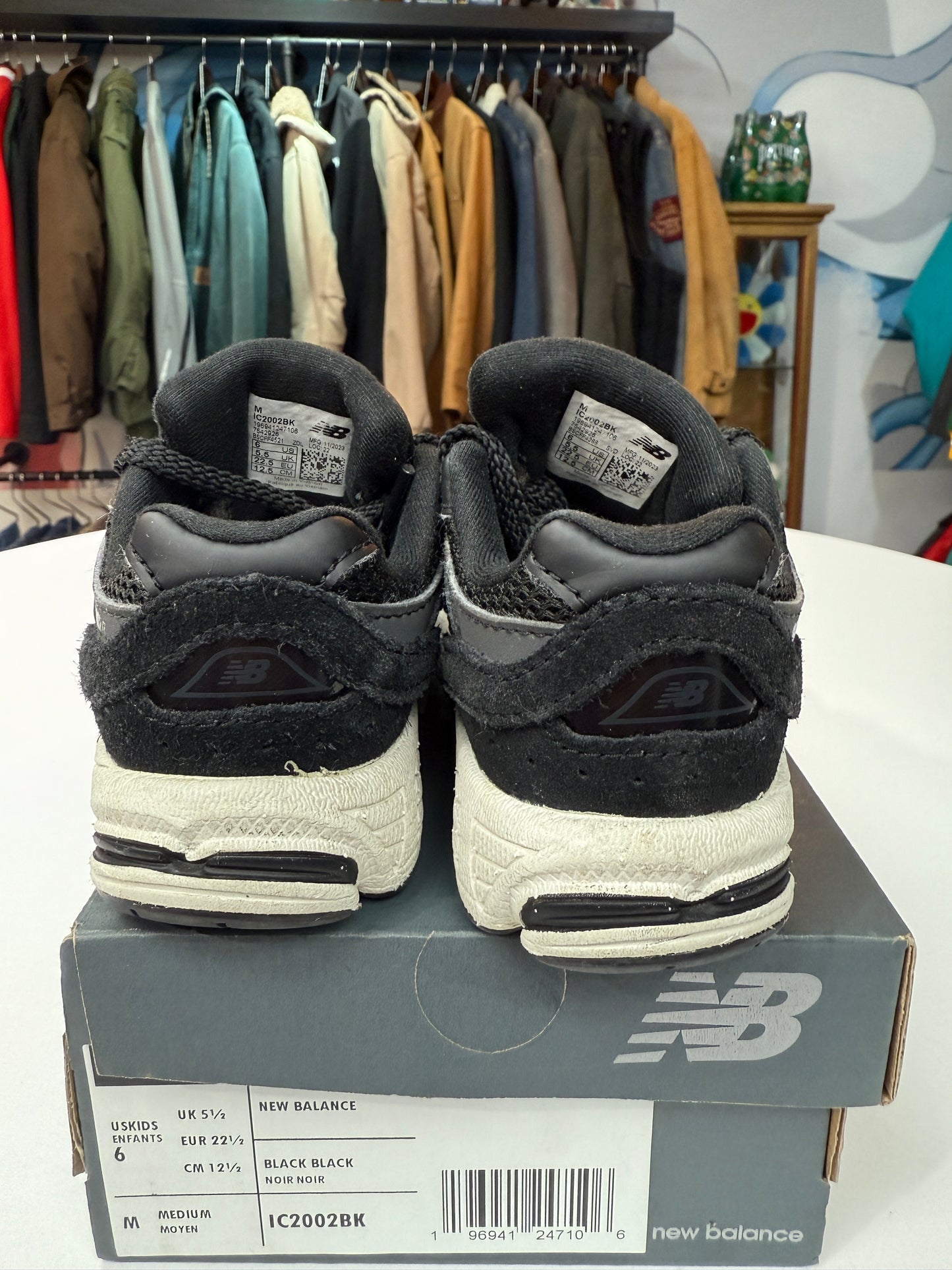 Preowned Black New Balance 2002R
